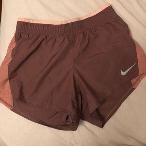 Mauve pink Nike running shorts